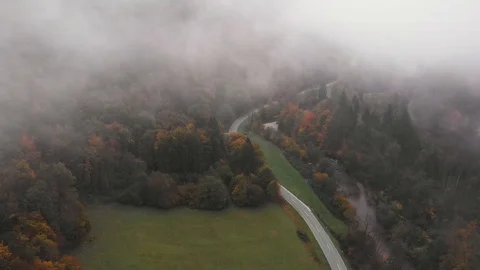 Autumn view of mountain road through the forest, in Slovenia Stock Footage 119202878