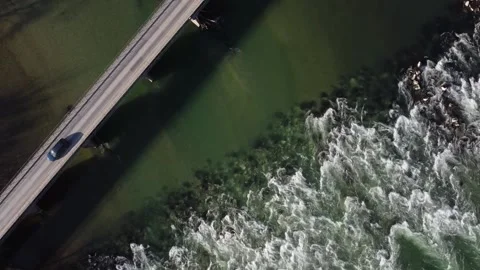 Autumn view rough river with rapids and bridge Stock Footage 142767048
