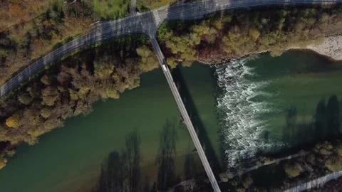 Autumn view rough river with rapids and bridge Stock Footage 142846719