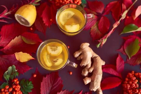 Autumnal composition with two cups of ginger tea Stock Photos