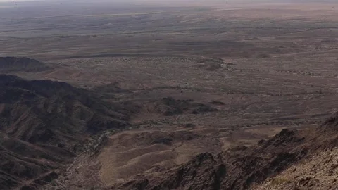 AV-8B Harrier flying through hostile terrain in Yuma, Arizona Stock Footage 151745230