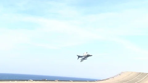 AV8-B Harrier II pass over bridge 動画素材 89880304