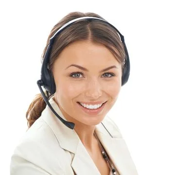 Available to help 247. A close-up studio shot of a smiling young female operator Stock Photos