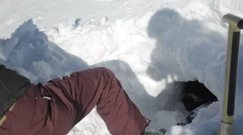 Avalanche lesson in hole under snow Stock Footage 46154451