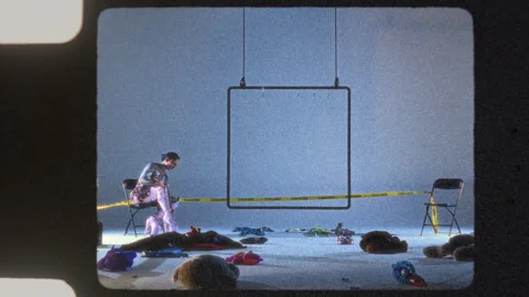 Avant-Garde Performers Creating Art With Caution Tape In Studio Setting Stock Footage 292845722