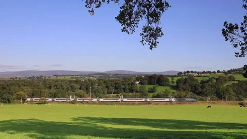 An Avanti Pendolino Train Heads Through the Countryside in Northern England Stock Footage 141308055