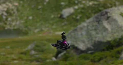 Avata drone with Osmo action camera mounted on top flying over Campagneda Video stock 251619830