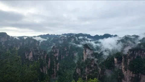 Avatar Mountains range covered with thick fog Stock Footage 337646341