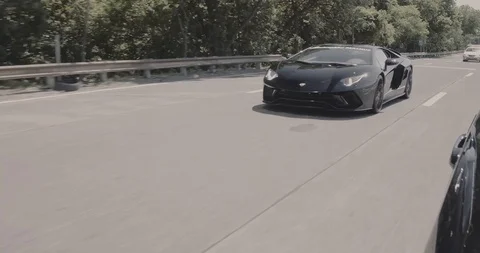 AventadorS Black drivingfront 스톡 동영상 103103356