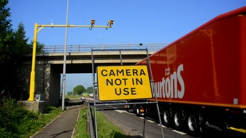 Average speed camera not in use warning sign at roadworks on the A64 york uk Stock Footage 92066768