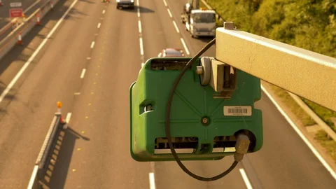 Average speed traffic camera over UK Motorway Vídeos de archivo 125684498