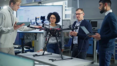 Aviation Engineers Work On New Drone Stock Footage 189856851