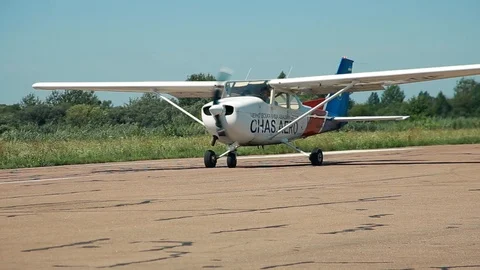 Aviation. Small plane aircraft accelerates on runway, takes off Stock Footage 101059827