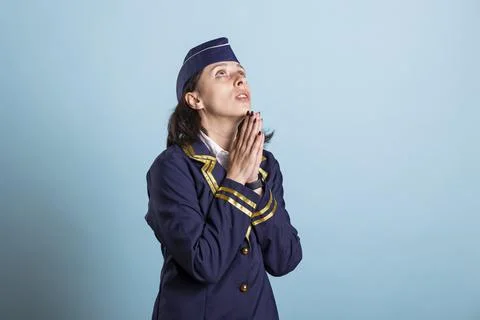 Aviator praying side view Stock Photos