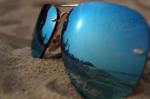 Aviator sunglasses  on a sandy beach in Sri Lanka Stock Photos