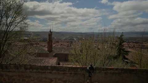 Avila cityscape from an elevated view, historic church tower emerging above.. Stock Footage 335642326