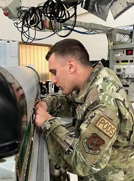 An Avionics Electronic Warfare Systems (POD) specialist assigned to the 14... Stock Photos