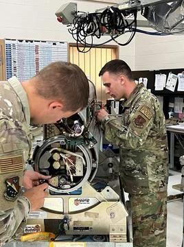Avionics Electronic Warfare Systems (POD) specialists assigned to the 148t... Stock Photos