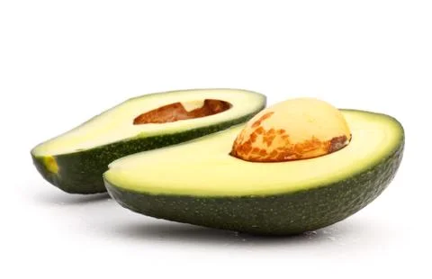 Avo?ado slices Stock Photos