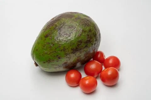 Avocado and cherry tomato close up Foto stock