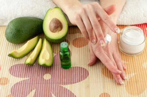 Avocado and Hands Stock Photos