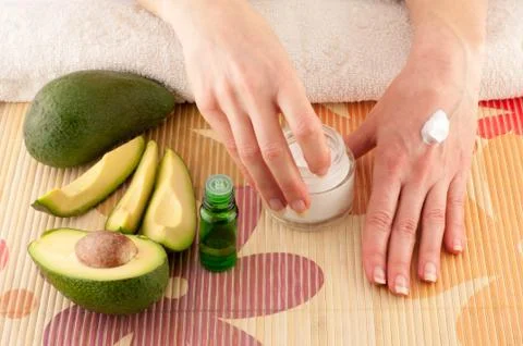 Avocado and Hands Stock Photos