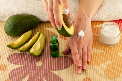 Avocado and Hands Stock Photos