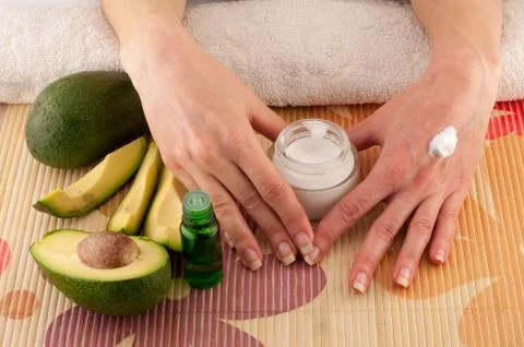 Avocado and Hands Stock Photos