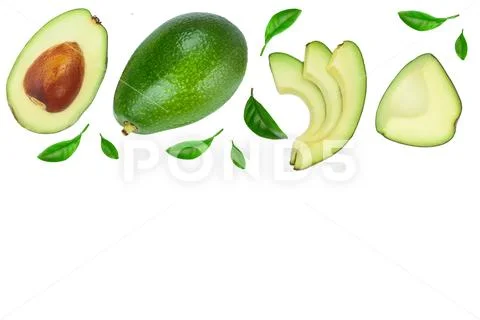 Avocado and slices decorated with green leaves isolated on white background with Stock Photos
