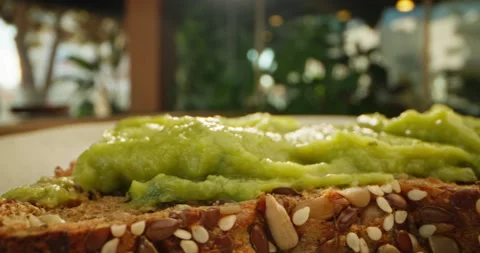Avocado Bliss: Step-by-Step Guide to Making Nama-Avocado Guacamole Sandwich Stock Footage 258639903