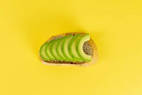 Avocado on bread. Stock Photos