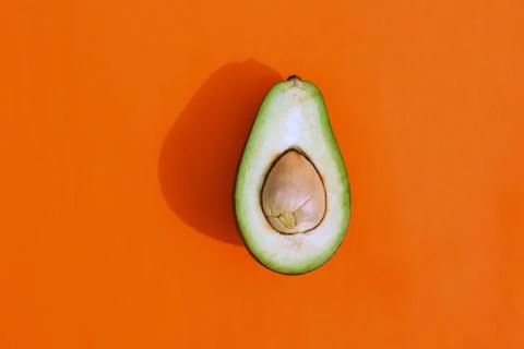 Avocado color on a solid background, the top view pattern Foto stock