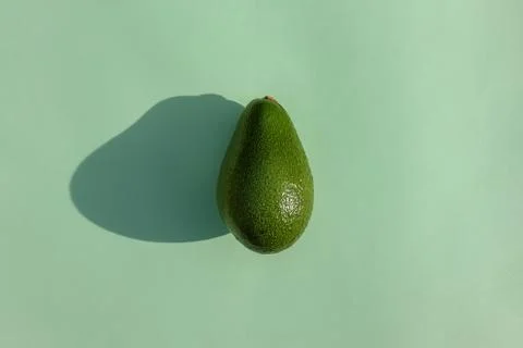 Avocado on a colored background food pattern 스톡 사진