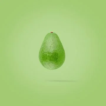 Avocado on creative colored background with clipping path as package design Stock Photos