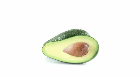 Avocado cut in half 스톡 동영상 23734672