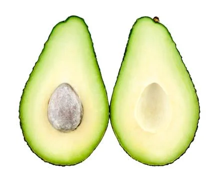 Avocado cut in half Stock Photos