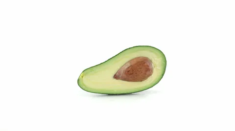 Avocado cut in half top view Vidéo 23727987