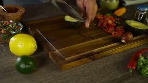 Avocado Cut with a Knife 11 Stock Footage 104982108