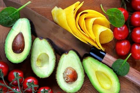 Avocado cut with mango Foto stock