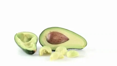 Avocado cut in pieces Stock Footage 98578660