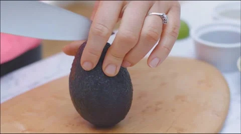 Avocado cutting and dicing Stock Footage