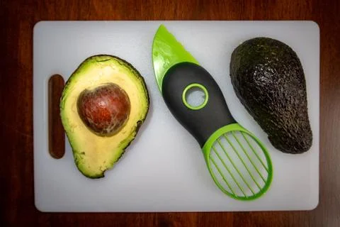 Avocado cutting tool Stock Photos