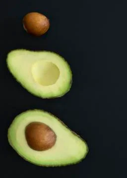 Avocado on a dark background Stock Photos