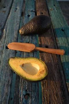 Avocado decorated on wood with wooden shovels Stock Photos