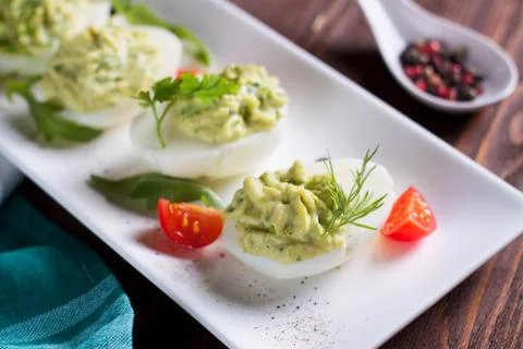 Avocado deviled eggs Foto stock