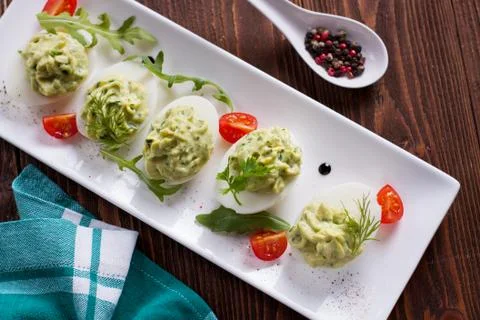 Avocado deviled eggs Stock Photos