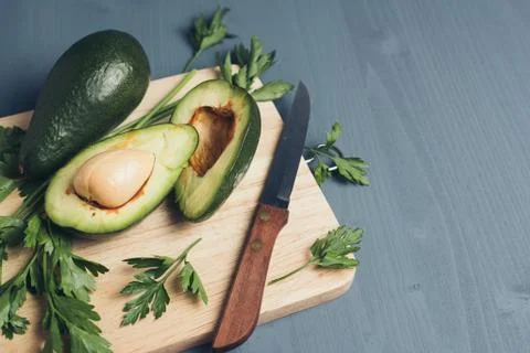 Avocado on a grey background. Foto stock