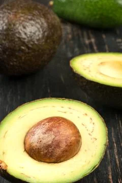 Avocado with halves Stock Photos