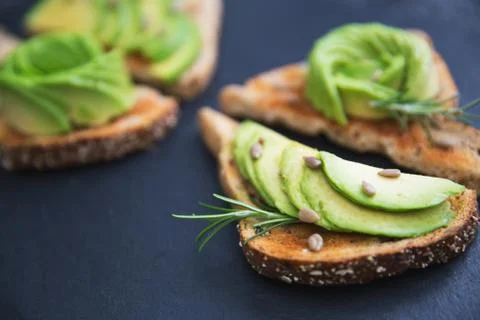 Avocado healthy breakfast on toast bread Stock Photos