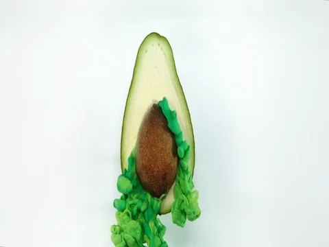 Avocado ink explosion Stock Footage 79542658